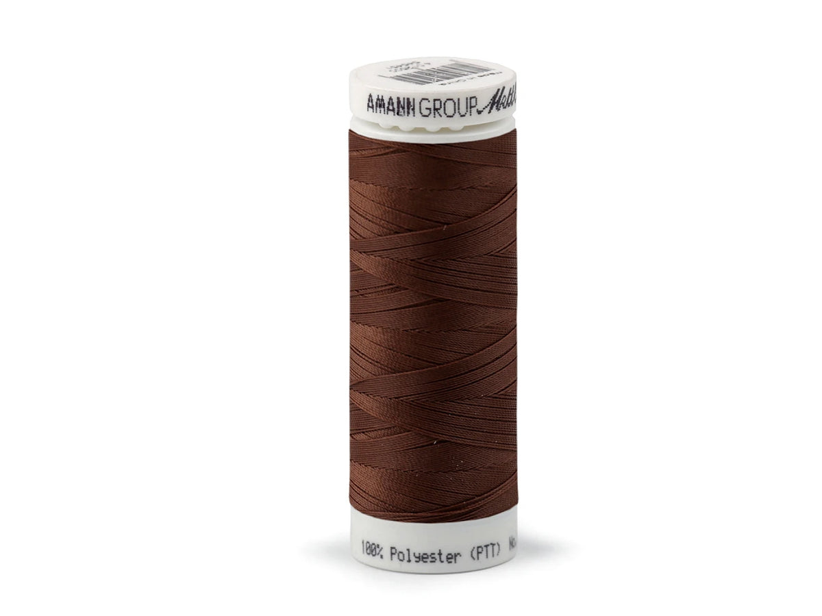 Polyesterové elastické nitě Mettler Seraflex - hnědá 130 m